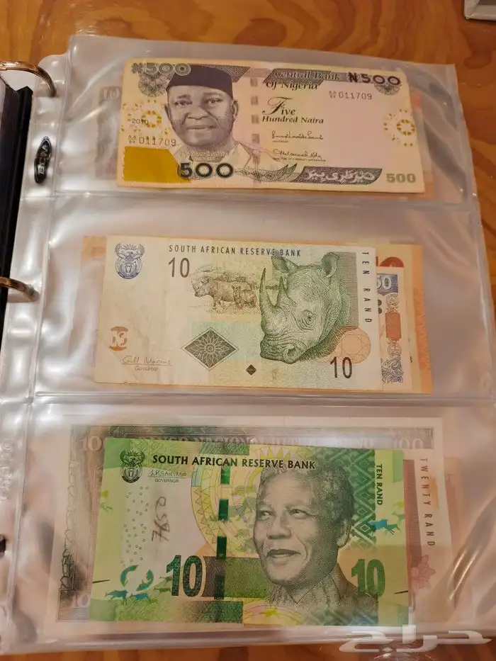 البوم عملات ورقيه ومعدينه قديمه 32