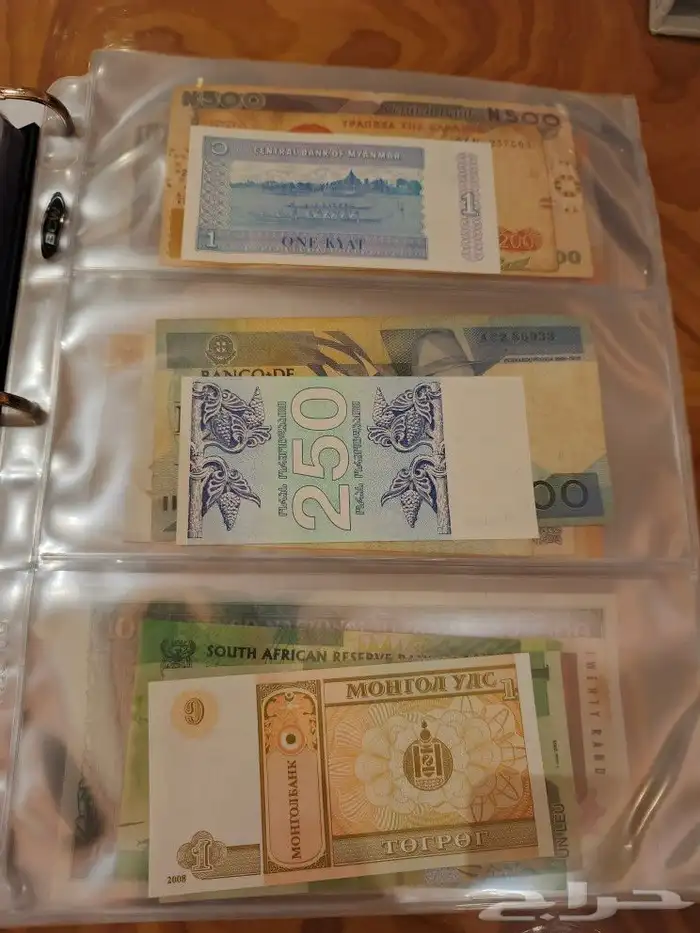 البوم عملات ورقيه ومعدينه قديمه 30