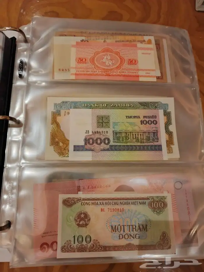 البوم عملات ورقيه ومعدينه قديمه 40