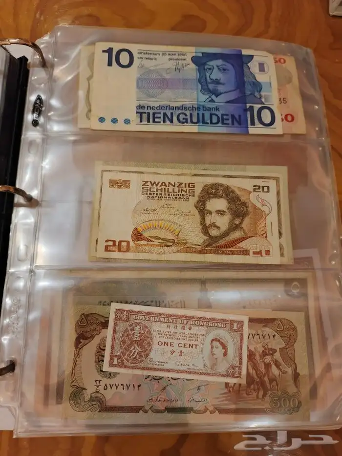 البوم عملات ورقيه ومعدينه قديمه 47