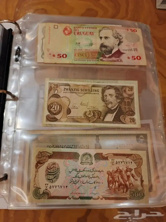 البوم عملات ورقيه ومعدينه قديمه 48