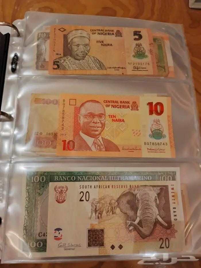 البوم عملات ورقيه ومعدينه قديمه 34