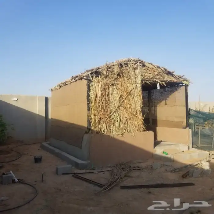 تركيب العريش وبناء الحجر التراثيه 8