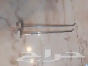 يوجد ديكور محل علاقات استندات مجسمات اطفال شناكر 3