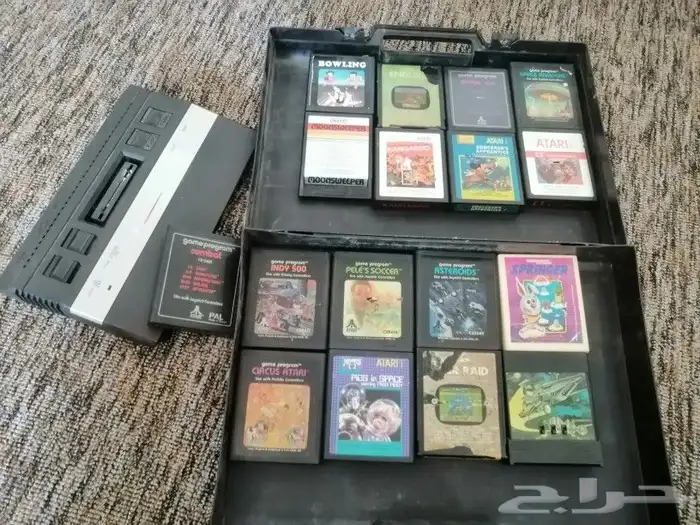 جهاز العاب اتاري مع اشرطه الالعاب 0