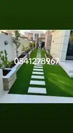 تنسيق حدائق عشب صناعي وبديل الخشب والإضاءة وعشب طبيعي واشجار 8