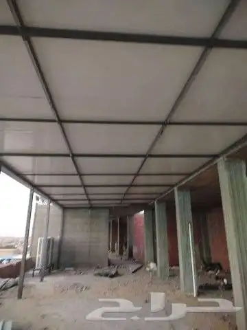 هناجر و مستودعات كبيره مظلات صاج بلن سندويتش سواتر حديد 2