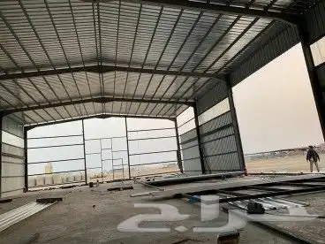 هناجر و مستودعات كبيره مظلات صاج بلن سندويتش سواتر حديد 0