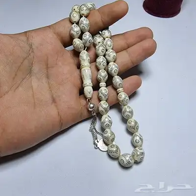 سبح عاج مطعه بالفضه 0
