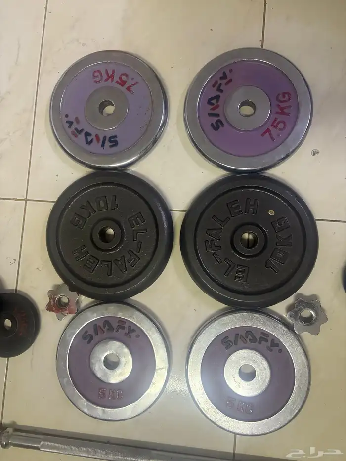 مجموعة أوزان حديد متعدده الحجم والوزن 8