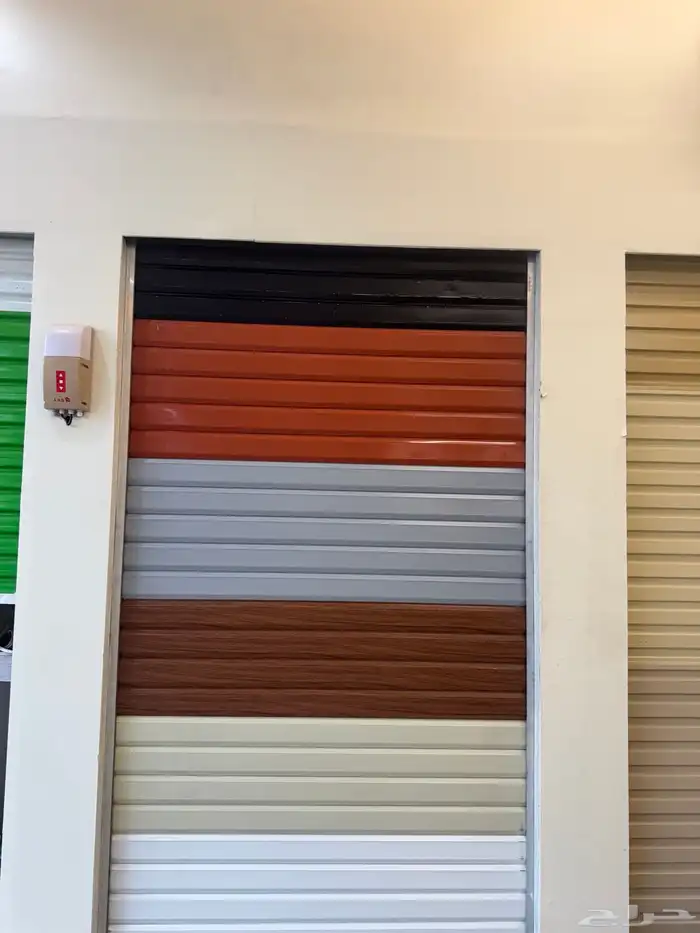 صيانة جميع ابواب الكراج والنوافذ الشتر وابواب الشتر والحديد 4