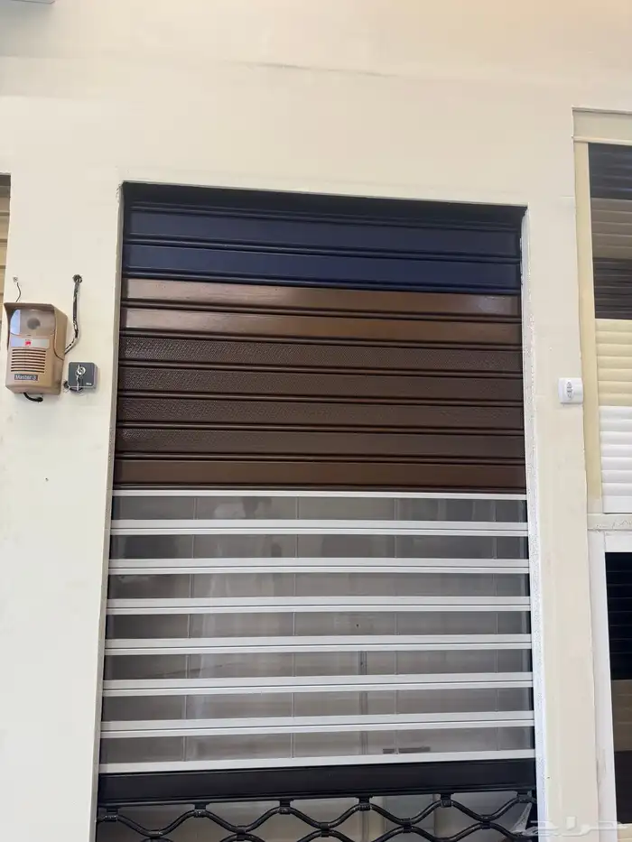 صيانة جميع ابواب الكراج والنوافذ الشتر وابواب الشتر والحديد 1