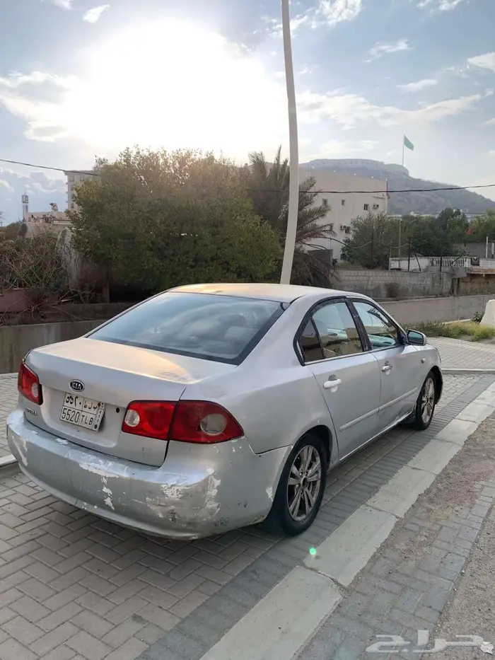 كيا اوبتيما 2006 نص فل 9