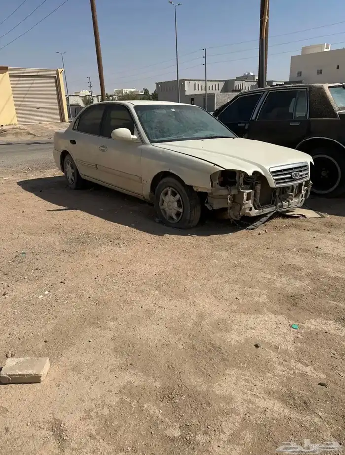 اوبتيما 2004 3