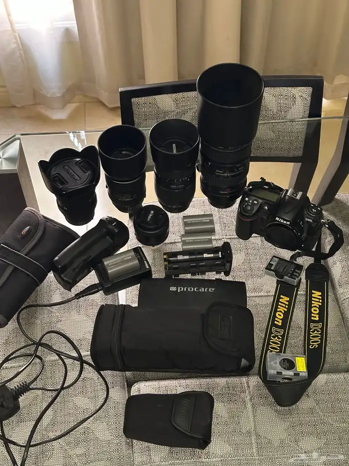 كاميرا Nikon D300s وعدسات تصوير وفلاتر وفلاش وبطاريات 17