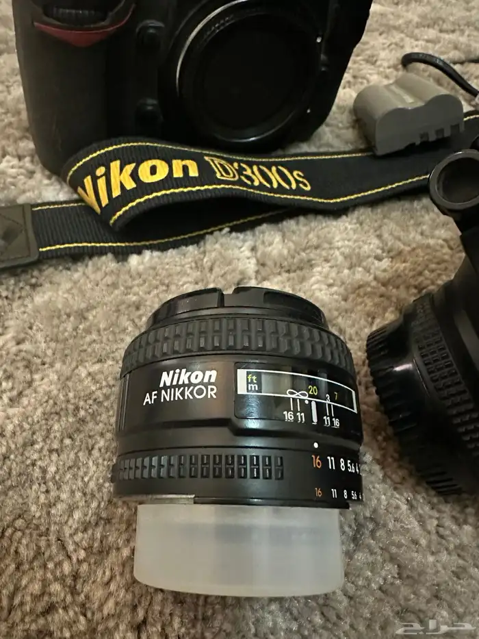 كاميرا Nikon D300s وعدسات تصوير وفلاتر وفلاش وبطاريات 10