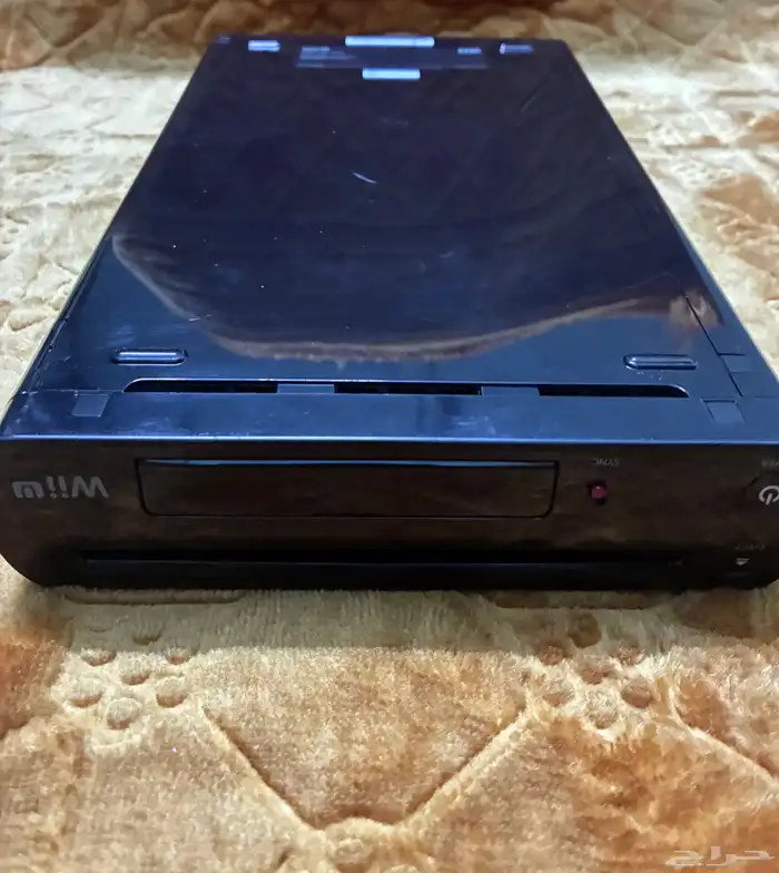 Wii U console جهاز وي يو بالكرتون 4