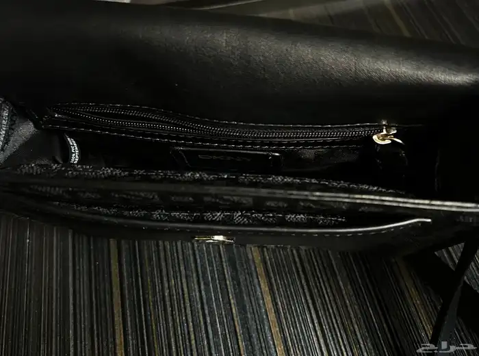 شنطة ماركة ديكني( DKNY ) شبه جديده 3