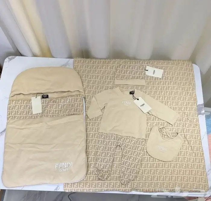 ملابس مواليد مدسات وأطقم مواليد 7