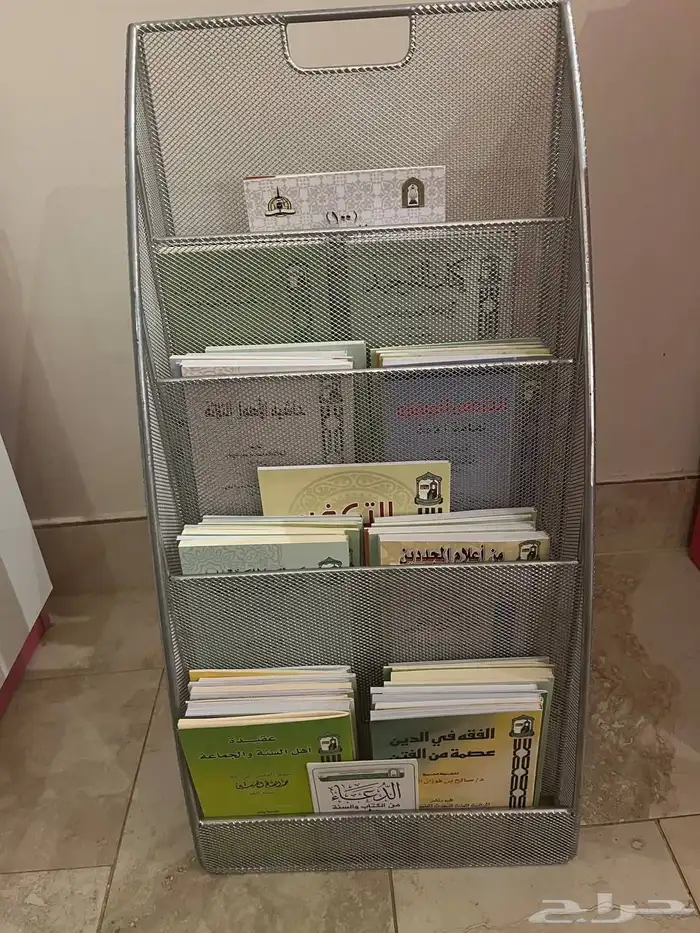 حامل للكتيبات الصغيرة أو المجلات. 0