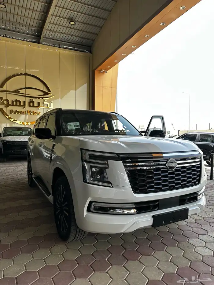 نيسان بلاتينوم فل كامل 2026 توين تربو ابيض سقف اسود 2