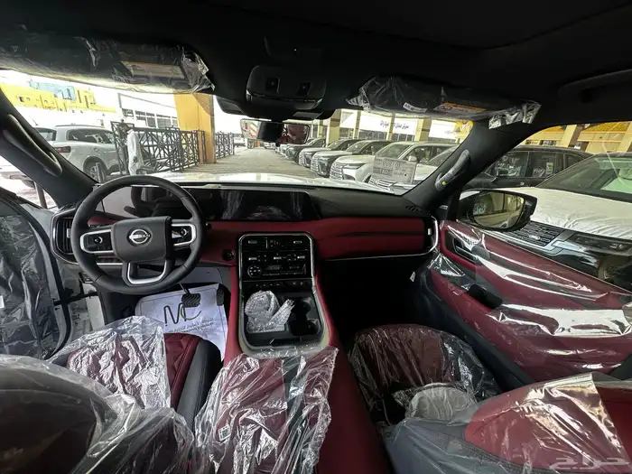 نيسان بلاتينوم فل كامل 2026 توين تربو ابيض سقف اسود 4