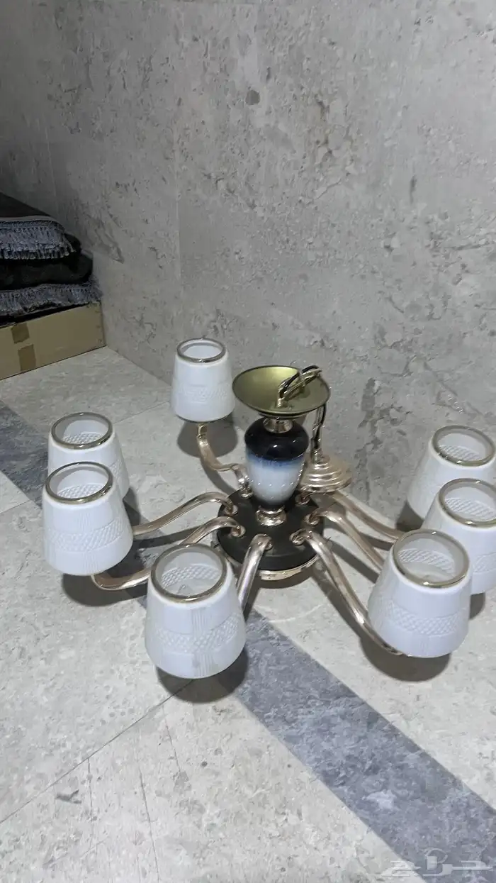 كنب حرف L وطاولات وثرية 12