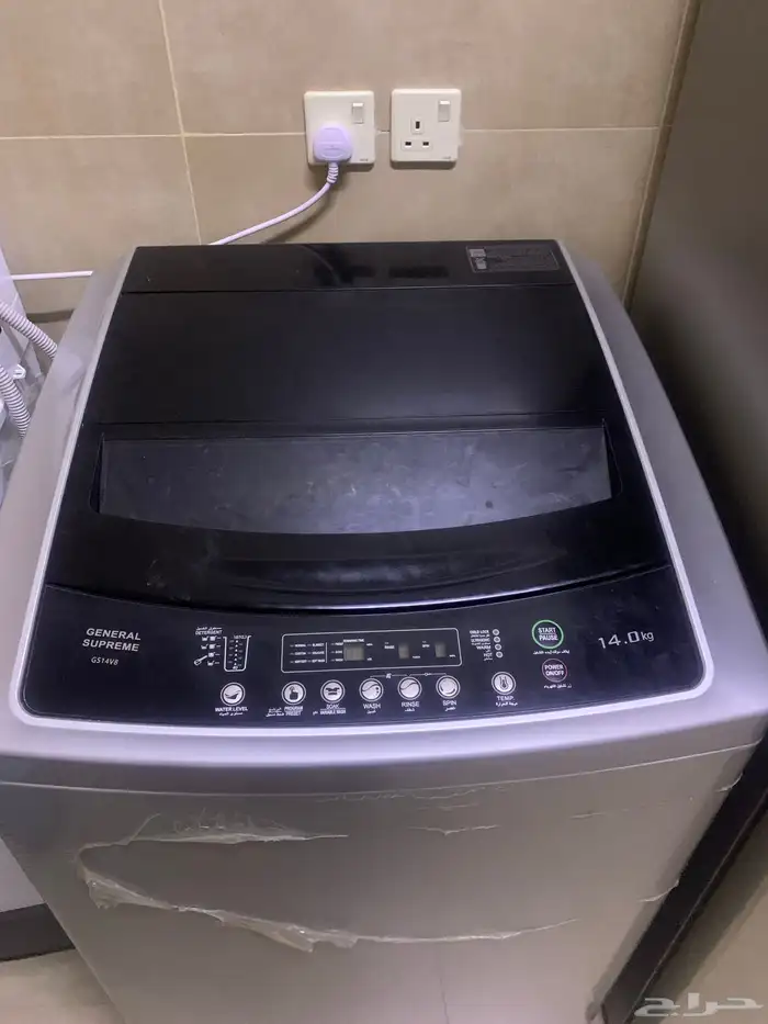 غسالة ملابس أتوماتيك 9