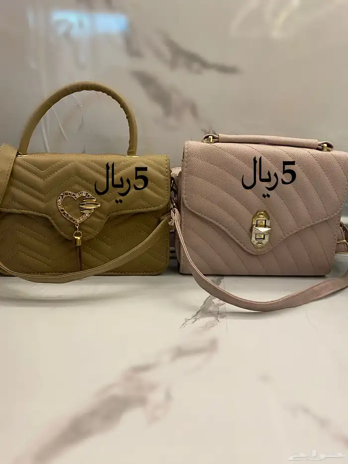 عندي مجموعه من الشنط مستعمله . كل شنطة لحالها ب 5 ريال .. 0