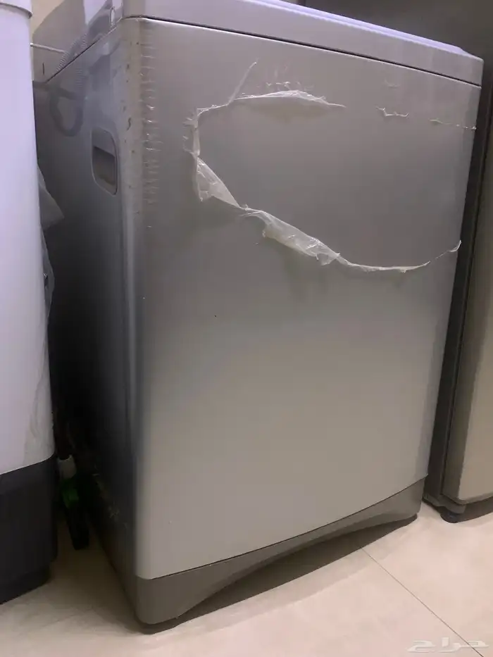 غسالة ملابس أتوماتيك 7