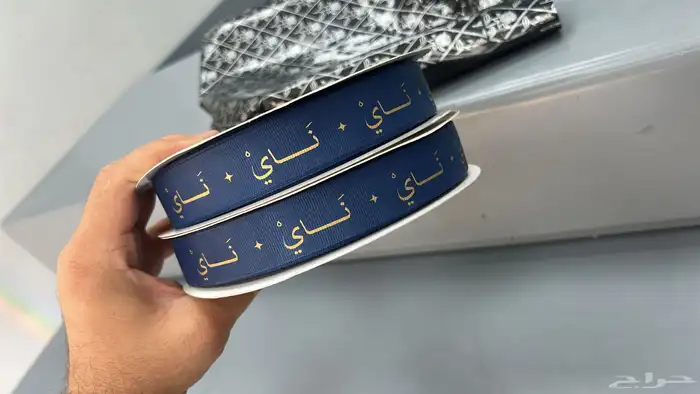 بوكسات عبايات اكياس لوقو جلد ليبل تطريز ورق تغليف 18