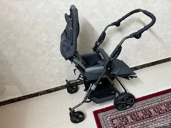 عربة طفال شديدي الإعاقة 1
