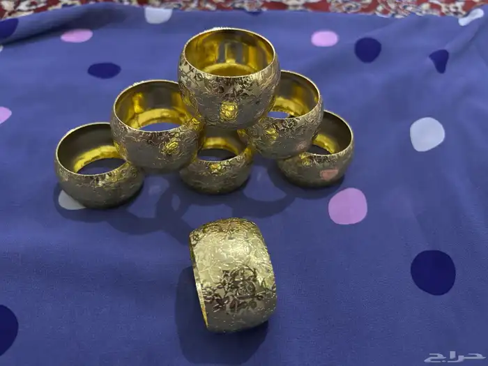 حلقات مناديل ذهبيه 0