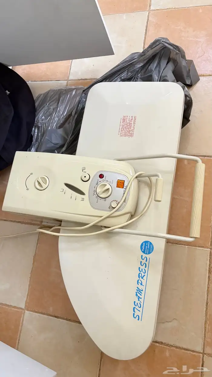 مكواة ملابس 0