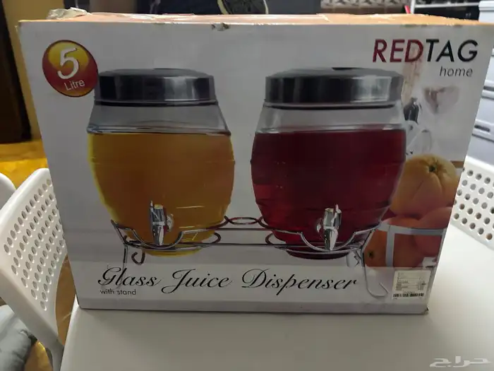 حامل عصير وموزع مع بعض ب 60 0