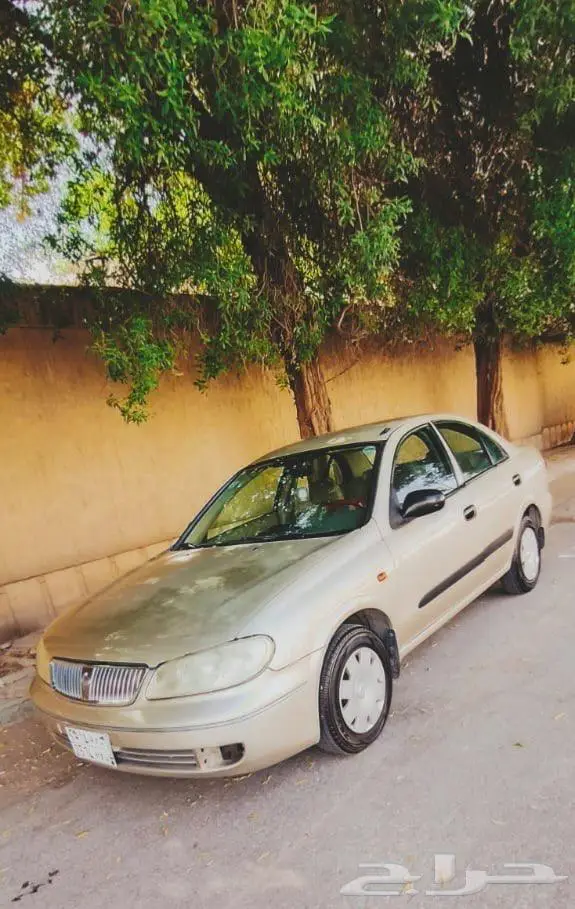 نيسان صني 2006   اللون  ذهبي 1