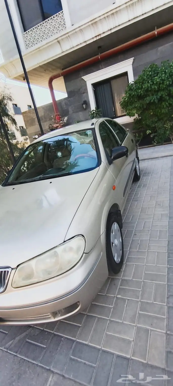 نيسان صني 2006   اللون  ذهبي 2