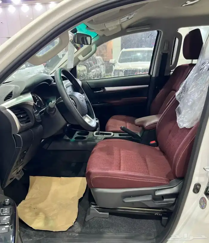 هايلوكس 2025 بنزين دبل تماتيك اصفار بطاقة جمركية كاش وبنك 13