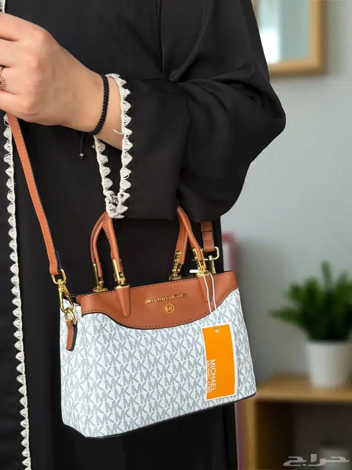شنط ونظارات نسائية ماركات كوبي ون 72
