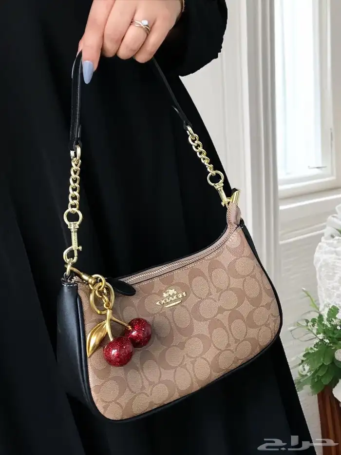 شنط ونظارات نسائية ماركات كوبي ون 52