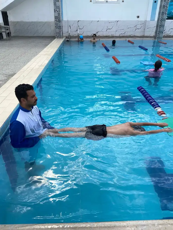 Swimming coach 15