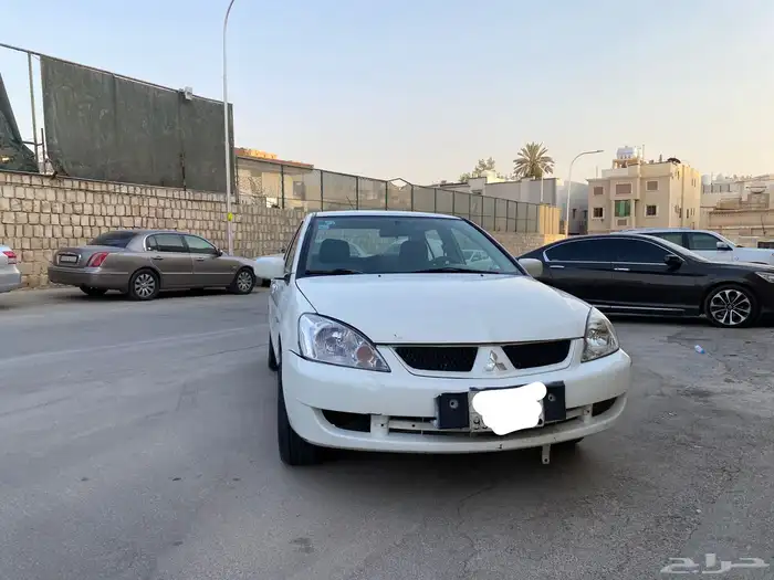 سيارة متسوبيشي لانسر موديل 2009 5