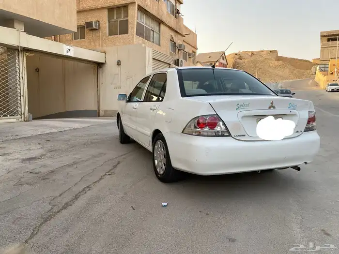 سيارة متسوبيشي لانسر موديل 2009 6