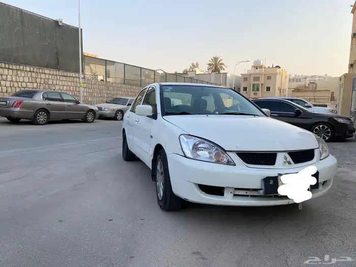 سيارة متسوبيشي لانسر موديل 2009 1