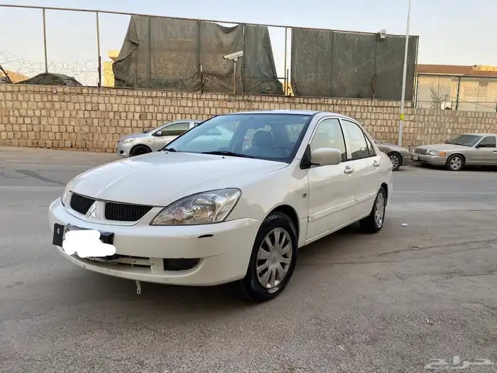سيارة متسوبيشي لانسر موديل 2009 2