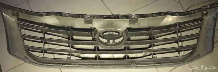 شبك مع العلامه أصلي هايلوكس من 12-15 1