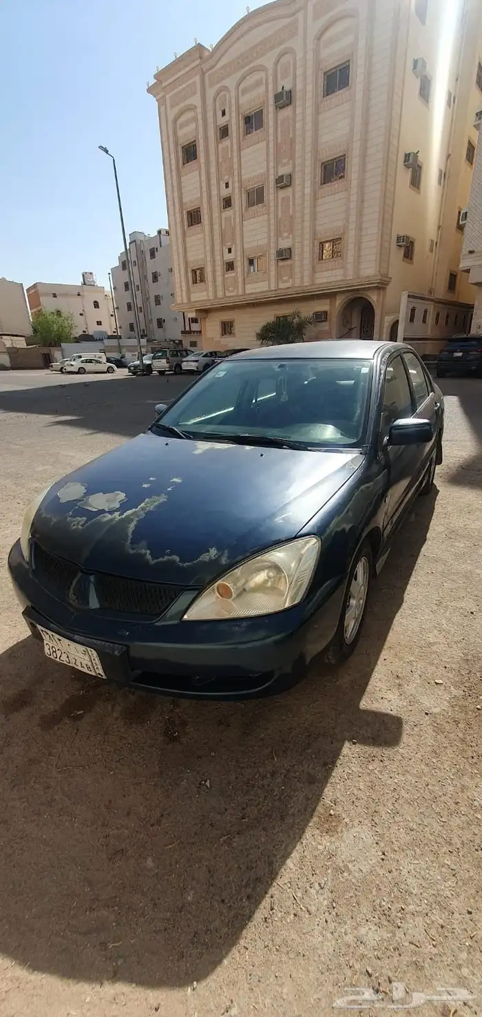 لانسر 2009 4