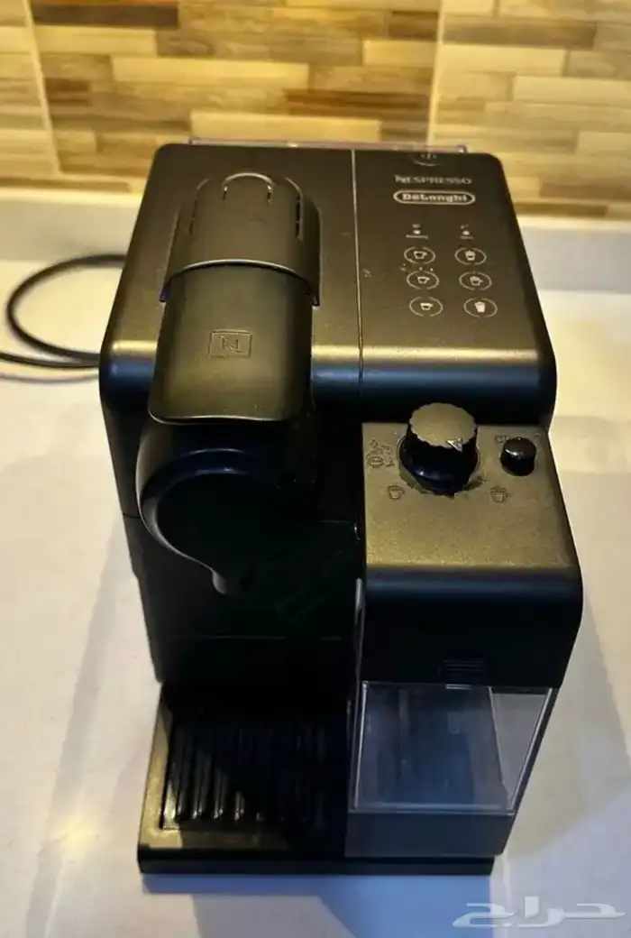 ماكينة نسبرسو ديلونجي شبه جديدة 0