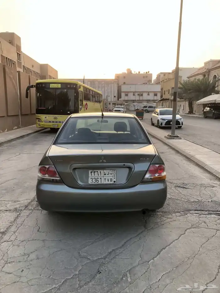 لانسر 2013 توماتيك رصاصي 11