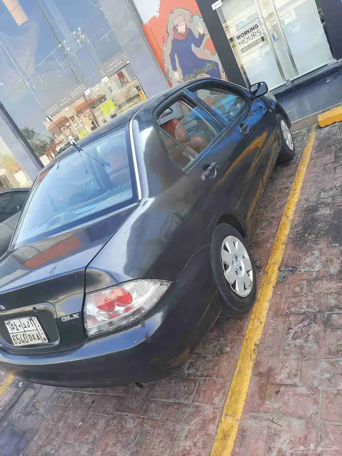 لانسر متسوبيشي 2003 لون رساسي غامق 2